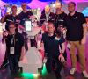 So sehen Sieger aus: Das Team der Universität Bonn mit ihrem Roboter-Avatar NimbRo.
